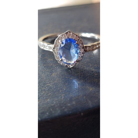 Elegant Rhodium-Plated Size 9 Ring with Blue Gemstone and Pave Halo - Picture 5 of 12